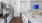 a kitchen with white cabinets