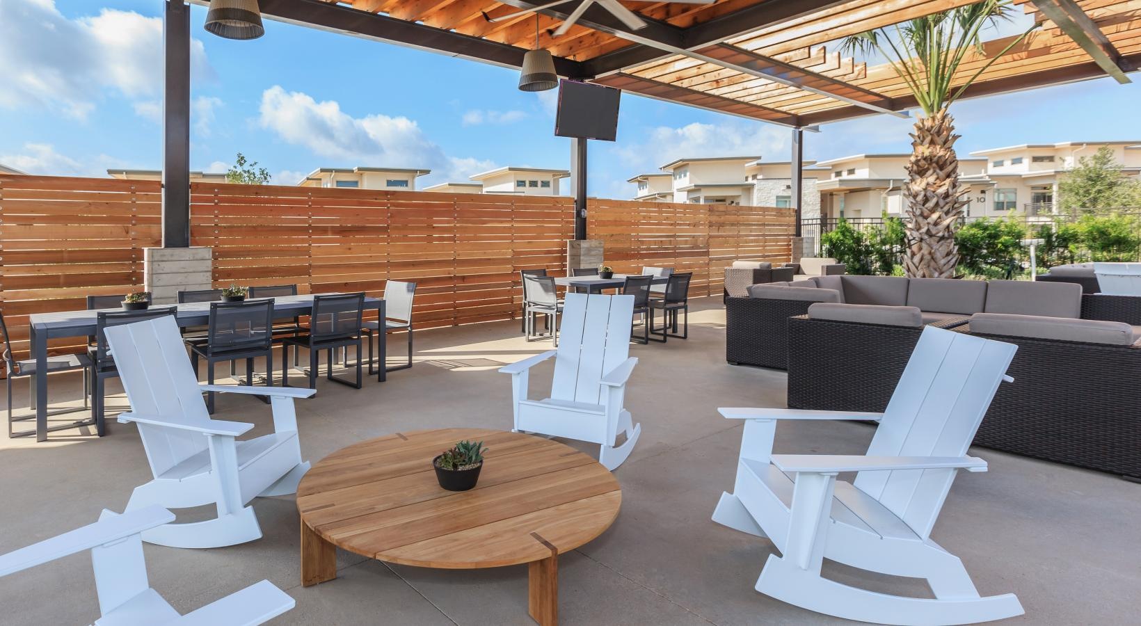 Find your perfect fit at Berkshire Santal a patio with tables and chairs