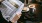 a person reading a newspaper