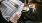 a person reading a paper